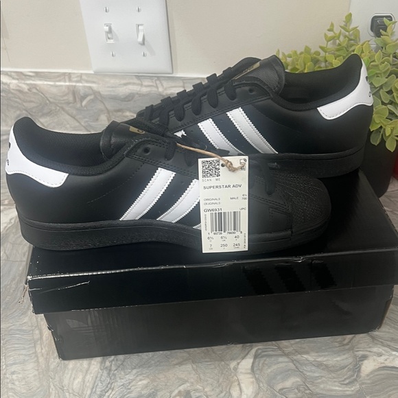 adidas Shoes - adidas Black Leather Sneakers with White Stripes